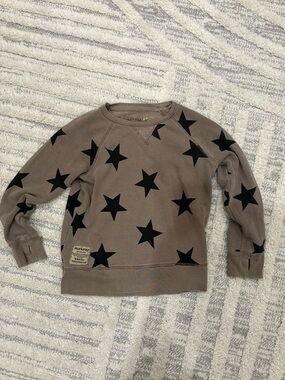 nununu Sweatshirt with Black Star Print